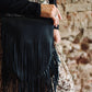 Natalia’s black leather fringe bag