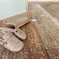 Charlie’s Beige Clogs